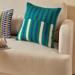 Coussin brodé "Disso"